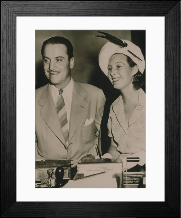 Framed Print : Hollywood producer, Mike Frankovich (1910-1992) and bride to be, English actress Binnie Barnes (1903-1996) in 1940. Bothhad long film careers extending into the 1960s
