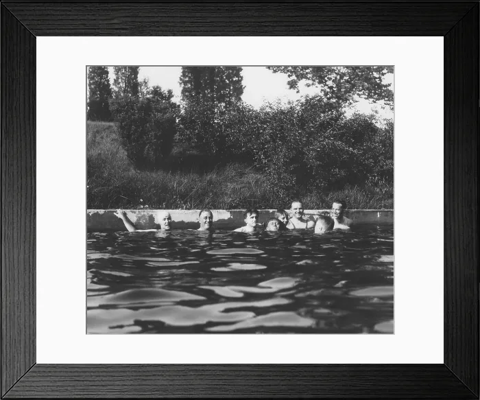 Framed Print : Franklin Roosevelt and Missy Lehand (left) with others in Hyde Park pool. 1930
