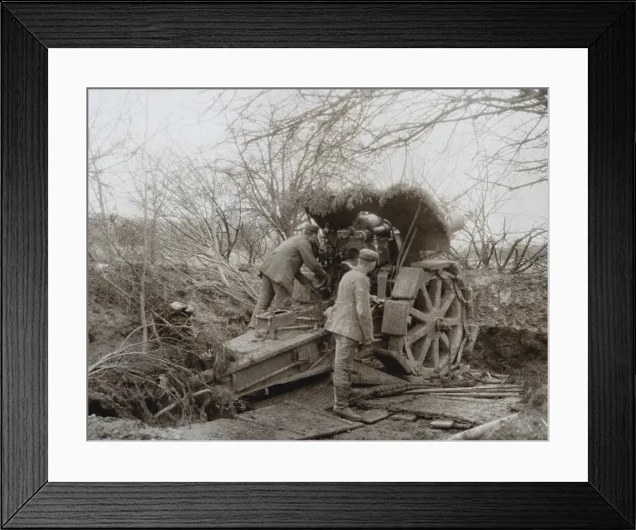 Framed Print : German Soldiers at a camouflaged Howitzer during World War 1. 1914-15. Artillery was the major weapon of WW1, accounting for 60% of casualties. (BSLOC_2013_5_47)
