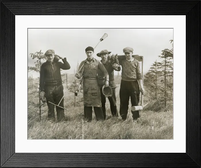 Framed Print : French workers with unexploded shells dug up on the French Frontier zone in 1936. In one day they found a rifle, machine gun, helmet, two shells, and two shell casings