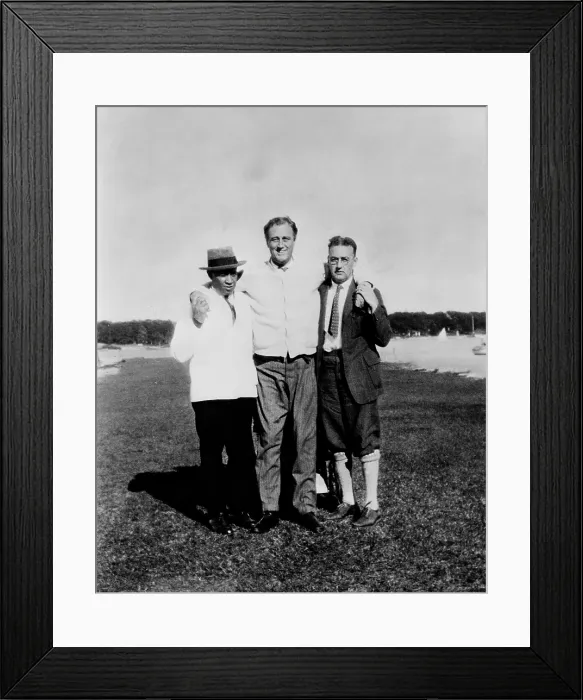 Framed Print : Franklin Roosevelt, his legs paralyzed by polio, standing with assistance in 1924. He is supported by Dr. Macdonald and his valet in Marion, Mass. (BSLOC_2013_5_53) Framed Print : Franklin Roosevelt, his legs paralyzed by polio, standing with assistance in 1924. He is supported by Dr. Macdonald and his valet in Marion, Mass. (BSLOC_2013_5_53)