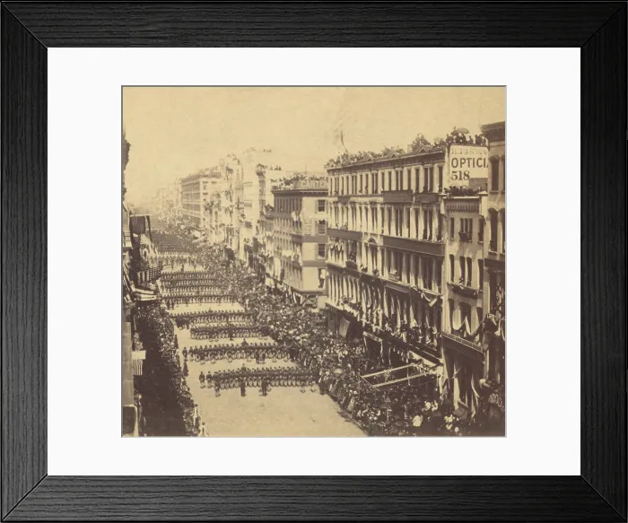 Framed Print : Marchers in Lincoln's New York funeral procession proceeding down Broadway away from the viewer ca. 1865