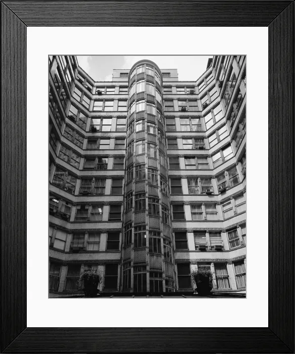 Framed Print : Rookery Building (1886), has a spiral staircase that ascends the courtyard wall, revealing a modern design and steel structure Framed Print : Rookery Building (1886), has a spiral staircase that ascends the courtyard wall, revealing a modern design and steel structure