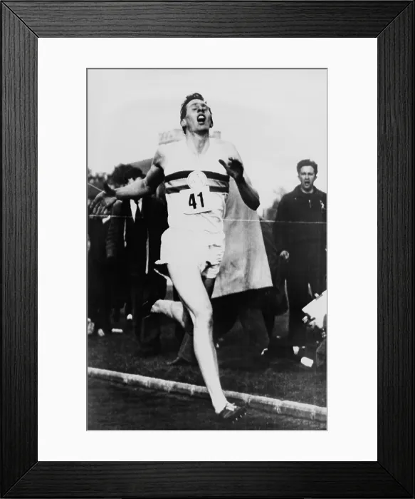 Framed Print : Roger Bannister crossing the finish line in three minutes and 59.4 seconds, achieving the four-minute mile, Oxford, England on May 6, 1954