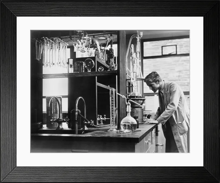 Framed Print : Scientist conducting a laboratory experiment in a cancer research facility in the United States, 1951