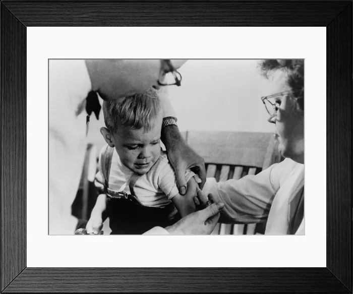 Framed Print : Newly available measles vaccine shot is given to a young boy in Upper Darby, Pennsylvania in 1963. The immunization is now part of the routine shots received by children