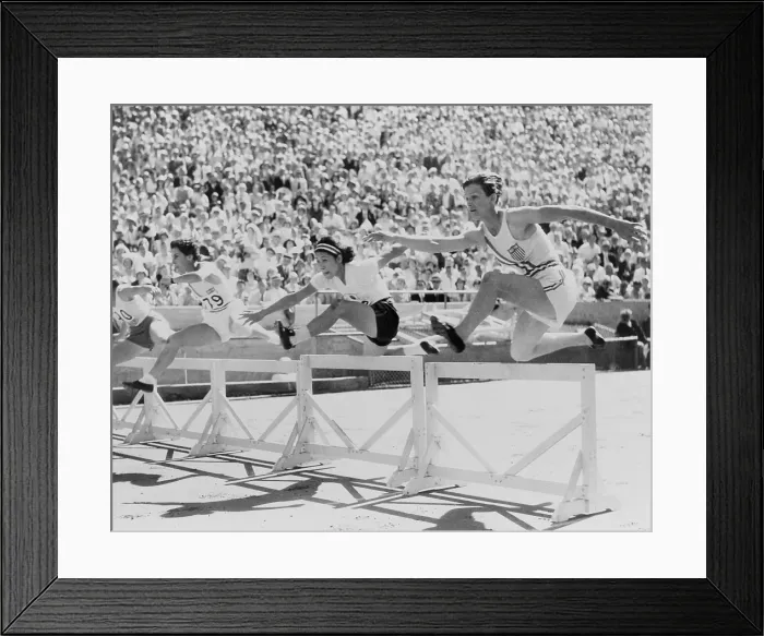 Framed Print : Mildred Babe Didrikson, (1911-1956), running in the first heat of the 80-meter hurdles, at the 1932 Olympics at Los Angeles. She won the Gold Medal for the event Framed Print : Mildred Babe Didrikson, (1911-1956), running in the first heat of the 80-meter hurdles, at the 1932 Olympics at Los Angeles. She won the Gold Medal for the event