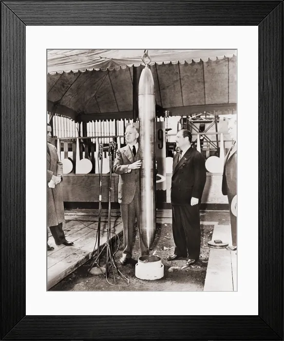 Framed Print : Grover Whalen and A.W. Robertson watching the Westinghouse Time Capsule being lowered into its crypt for 5000 years, at the New York World's Fair in 1938