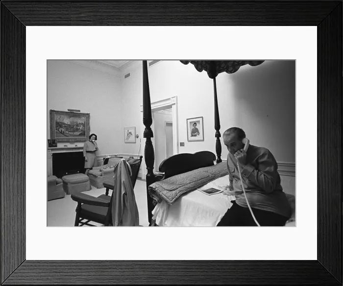 Framed Print : Lady Bird and President Johnson taking phone calls in their White House bedroom after he announced his withdrawal from the 1968 presidential election. March 31, 1968 Framed Print : Lady Bird and President Johnson taking phone calls in their White House bedroom after he announced his withdrawal from the 1968 presidential election. March 31, 1968
