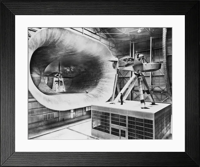 Framed Print : Mammoth seven story high wind tunnel, used in testing airplane design. 1932