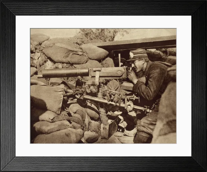 Framed Print : World War 1. Solitary Belgian soldier in an advanced post aiming a Maxim machine gun against invading Germans. 1914 Framed Print : World War 1. Solitary Belgian soldier in an advanced post aiming a Maxim machine gun against invading Germans. 1914