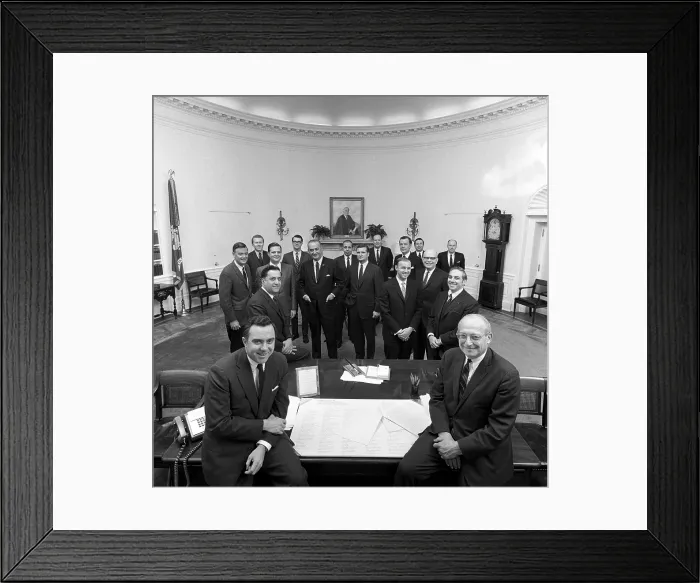 Framed Print : President Lyndon Johnson posing with his staff on Jan 10, 1968, days before the end of his five year presidency. Front row seated L-R: Joe Califano, Walt Rostow