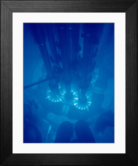 Framed Print : Idaho National Laboratory's Advanced Test Reactor core powered up, with the fuel plates glowing bright blue. The core is submerged in water for cooling