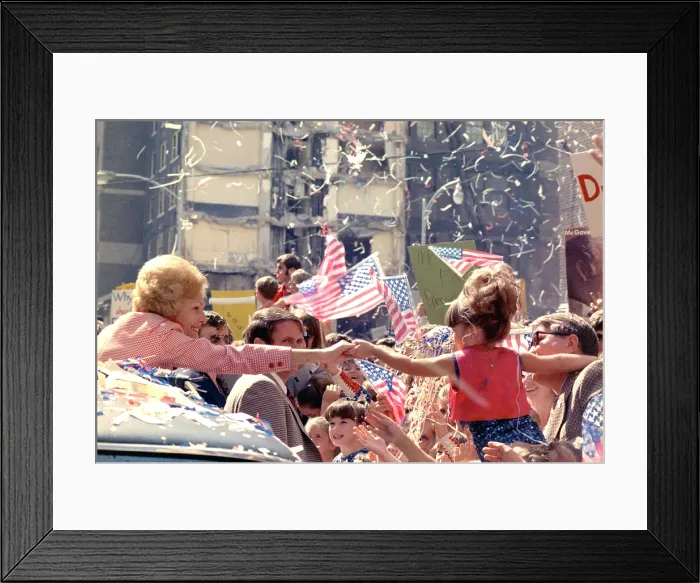 Framed Print : 1972 Nixon presidential campaign. Pat Nixon reaches out to a little girl from her car in a campaign motorcade in Atlanta Georgia