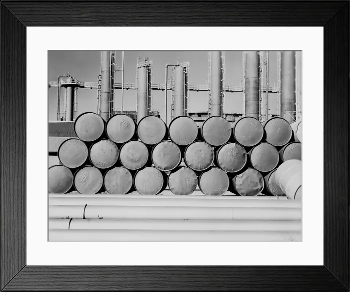 Framed Print : Oil barrels at the Phillips oil refinery in Borger Texas in 1942. The standard oil barrel contains 42 US gallons Framed Print : Oil barrels at the Phillips oil refinery in Borger Texas in 1942. The standard oil barrel contains 42 US gallons