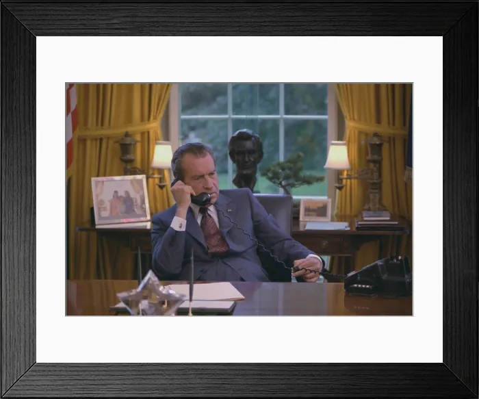 Framed Print : Candid photo of Richard Nixon at his desk in the oval office was taken during a filming for the 1972 GOP convention. June 23 1972