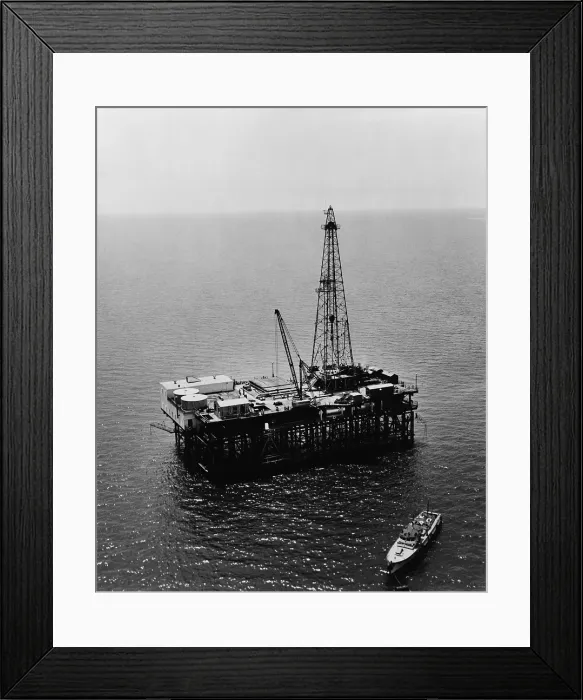 Framed Print : Humble Oil & Refining Company offshore drilling platform in the Gulf of Mexico, located on the tidal oil lands bordering Louisiana and Texas. 1950
