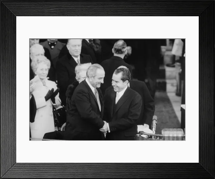 Framed Print : President Lyndon Johnson warmly shakes hands with President-elect Richard Nixon at the Jan. 20 1969 inauguration ceremony