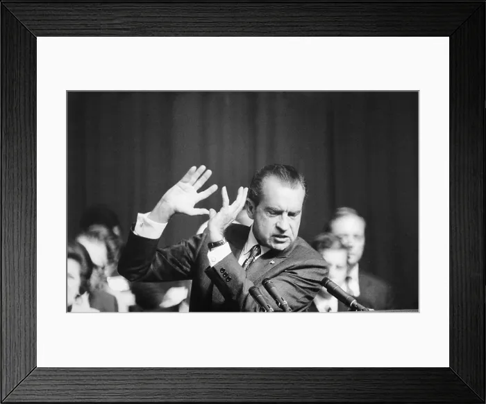 Framed Print : President Richard Nixon gesturing with his hands while speaking. Ca. 1969-74