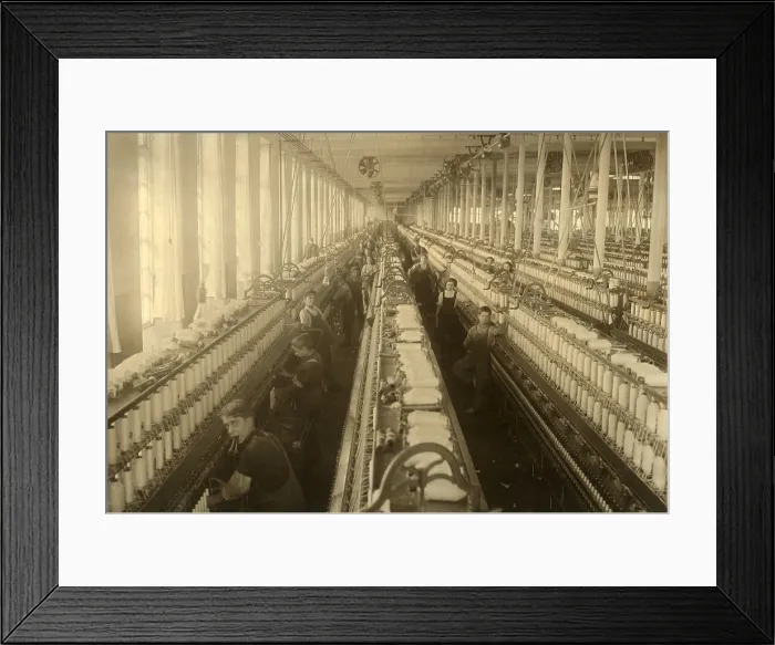 Framed Print : Young boys and girls working in the spinning room of the Cornell Mill in Fall River, Massachusetts. January 1912 photo by Lewis Hine