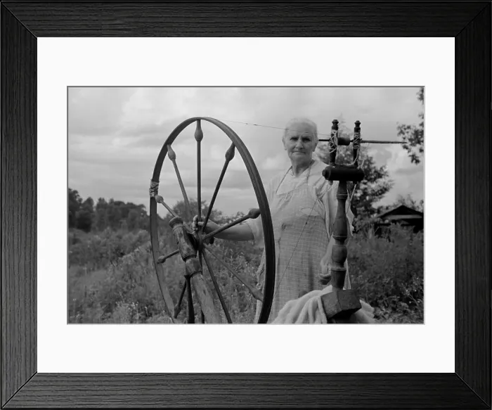Framed Print : Elderly woman at her spinning wheel in the Ozark Mountains of Arkansas. August 1935 Framed Print : Elderly woman at her spinning wheel in the Ozark Mountains of Arkansas. August 1935