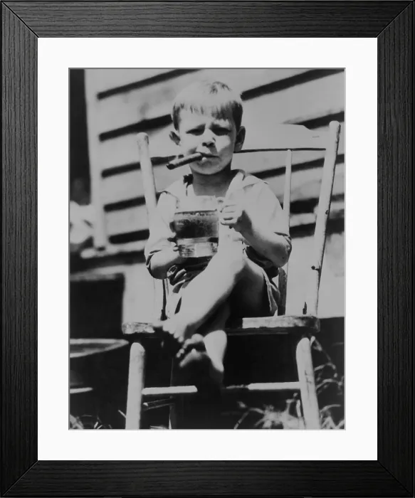 Framed Print : World's toughest 3-year-old, sits in chair holding mug of beer while smoking a cigar, 1935. (BSLOC_2013_8_101) Framed Print : World's toughest 3-year-old, sits in chair holding mug of beer while smoking a cigar, 1935. (BSLOC_2013_8_101)