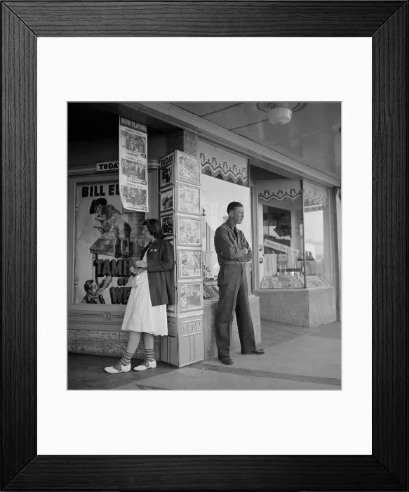 Framed Print : Young man and women waiting for the movie house to open in Tulare, San Joaquin Valley, 1940. The youth is an enrollee in the Civilian Conservation Corps. (BSLOC_2013_8_106) Framed Print : Young man and women waiting for the movie house to open in Tulare, San Joaquin Valley, 1940. The youth is an enrollee in the Civilian Conservation Corps. (BSLOC_2013_8_106)