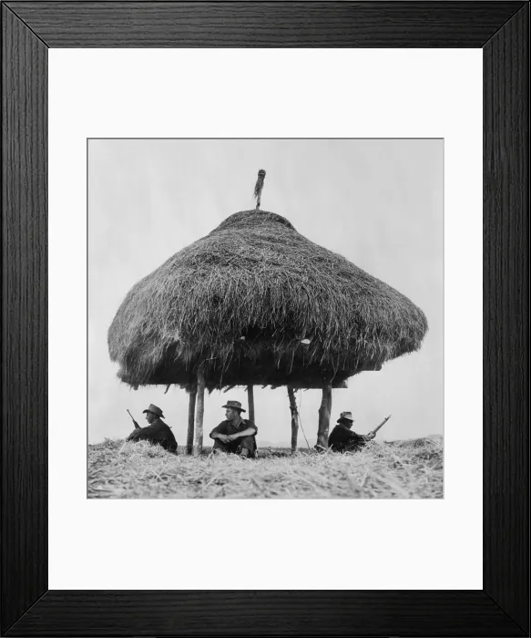 Framed Print : French Foreign Legion soldiers keeping lookout for Viet Minh fighters under the shelter of a thatched radio hut in 1951.The French Indochina War (1946-1954)