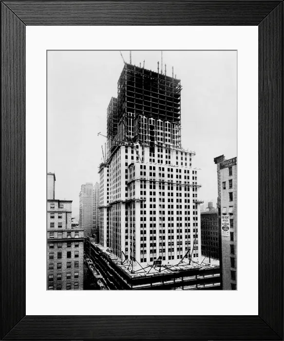 Framed Print : Empire State Building under construction in the early 1930s. The steel frame is built up to the 40th floor Framed Print : Empire State Building under construction in the early 1930s. The steel frame is built up to the 40th floor