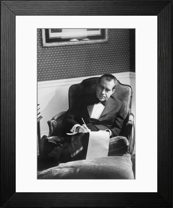 Framed Print : Richard Nixon working in the Lincoln sitting room. Ca. 1969-74