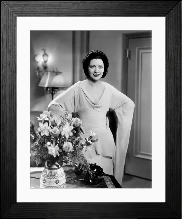 Framed Print : MARY STEVENS, M.D. Kay Francis, in a gown by Orry-Kelly, 1933