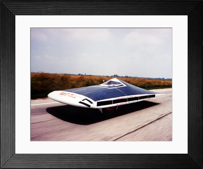 Framed Print : Solar car on the road during the SUNRAYCE 1995 race of experimental solar vehicles from Indianapolis to Golden, Colorado in June 1995