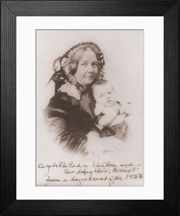 Framed Print : Elizabeth Cady Stanton (1815-1902), holding her infant daughter Harriot, one of her seven children in 1856. Harriot (1856-1940), followed her mother as an feminist activist