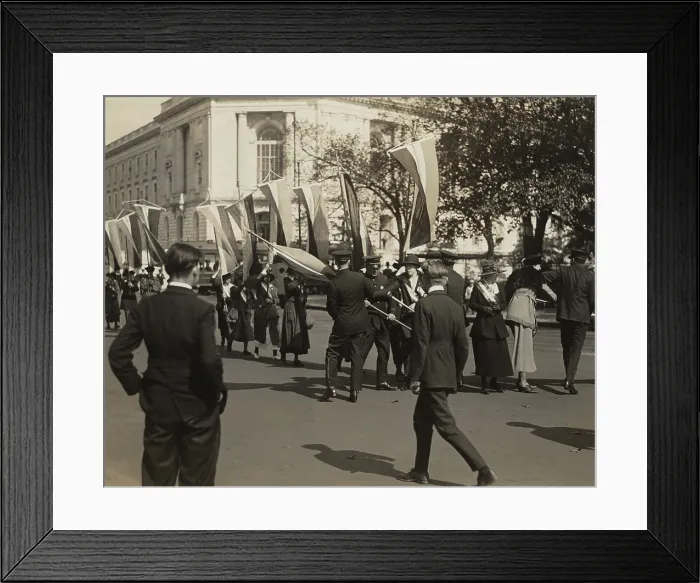 Framed Print : Police confront a line of National Woman's Party pickets and seize their banners on Constitution Avenue, outside Senate Office Building in October 1918
