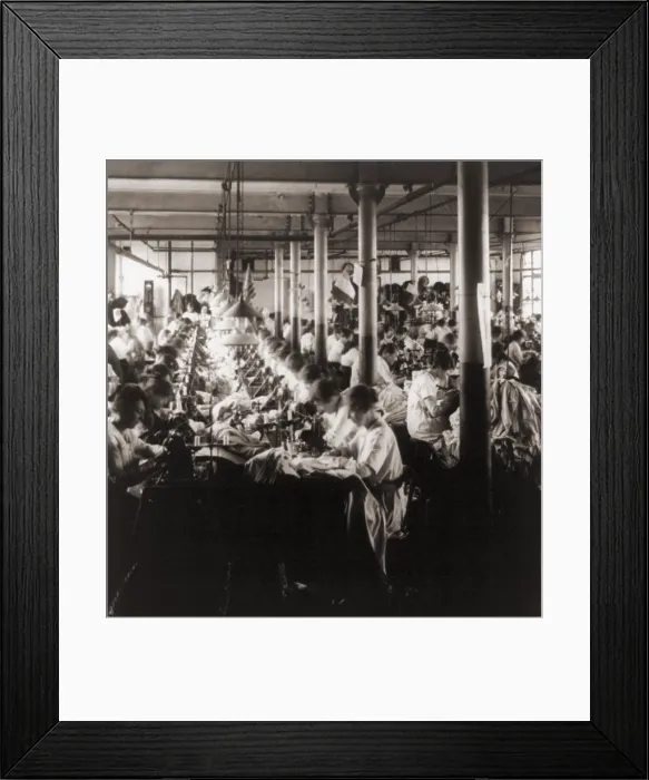 Framed Print : Women working at sewing machines in factory in Leicester, England. 1923