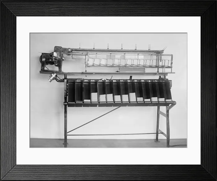 Framed Print : Tabulating machine used in the 1920 United States census. It was a predecessor of electronic computers, and worked by mechanically reading punch cards with coded information Framed Print : Tabulating machine used in the 1920 United States census. It was a predecessor of electronic computers, and worked by mechanically reading punch cards with coded information