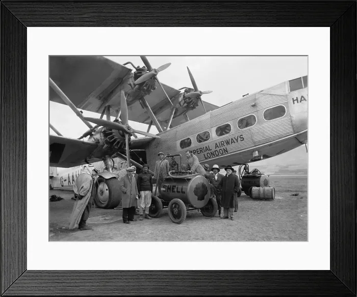 Framed Print : Four engine passenger plane of the Imperial Airways refueling from a Shell Oil Company mobile fuel tank at Semakh, in north Palestine in October 1931 Framed Print : Four engine passenger plane of the Imperial Airways refueling from a Shell Oil Company mobile fuel tank at Semakh, in north Palestine in October 1931