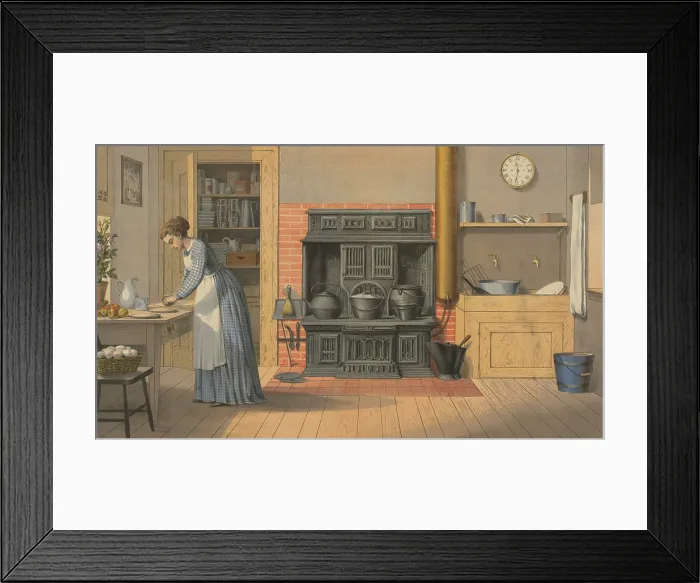 Framed Print : Woman working in an up-to-date kitchen of 1875. The cast iron stove replaced the open hearth fireplace for cooking Framed Print : Woman working in an up-to-date kitchen of 1875. The cast iron stove replaced the open hearth fireplace for cooking
