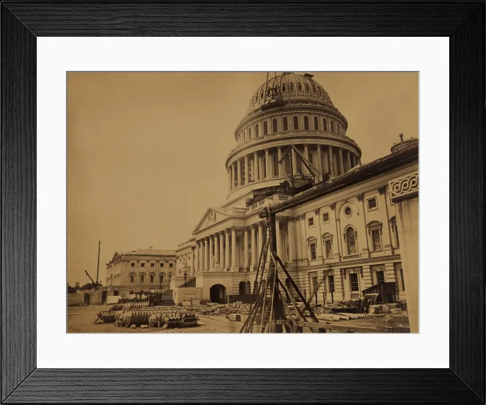 Framed Print : United States Capitol Building in 1863, showing the dome under construction. In the foreground are pre-formed cast-iron metal facings for the new dome. Photo by Andrew J. Russell Framed Print : United States Capitol Building in 1863, showing the dome under construction. In the foreground are pre-formed cast-iron metal facings for the new dome. Photo by Andrew J. Russell