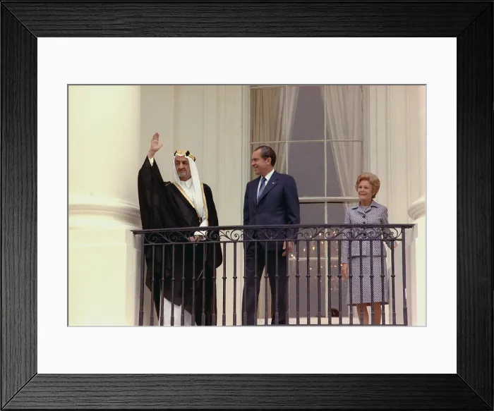 Framed Print : King Faisal of Saudi Arabia waves from the White House balcony after his welcome from President and Pat Nixon. May 27 1971 Framed Print : King Faisal of Saudi Arabia waves from the White House balcony after his welcome from President and Pat Nixon. May 27 1971