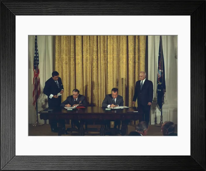 Framed Print : Richard Nixon and Leonid Brezhnev signing the Cooperation Agreement for Peaceful Uses of Atomic Energy. June 21 1973 Framed Print : Richard Nixon and Leonid Brezhnev signing the Cooperation Agreement for Peaceful Uses of Atomic Energy. June 21 1973