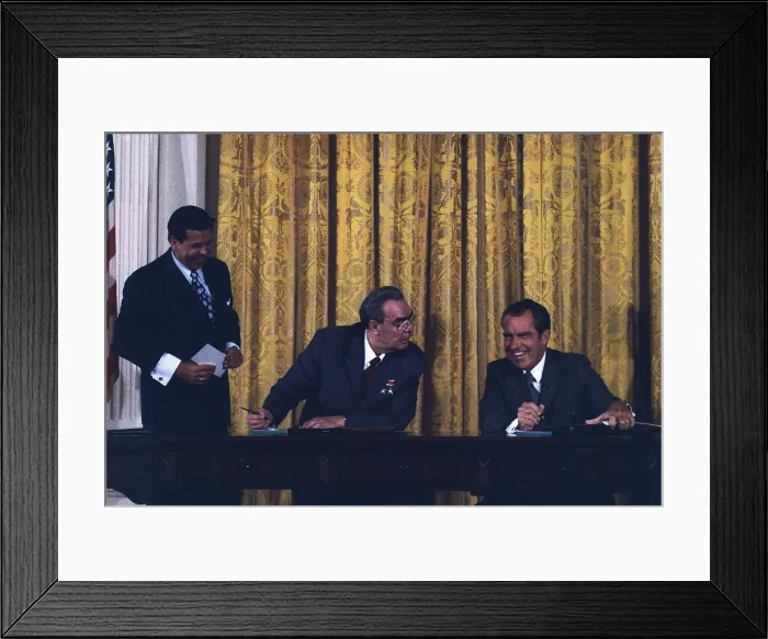 Framed Print : Richard Nixon and Leonid Brezhnev signing the Cooperation Agreement for Peaceful Uses of Atomic Energy. June 21 1973 Framed Print : Richard Nixon and Leonid Brezhnev signing the Cooperation Agreement for Peaceful Uses of Atomic Energy. June 21 1973