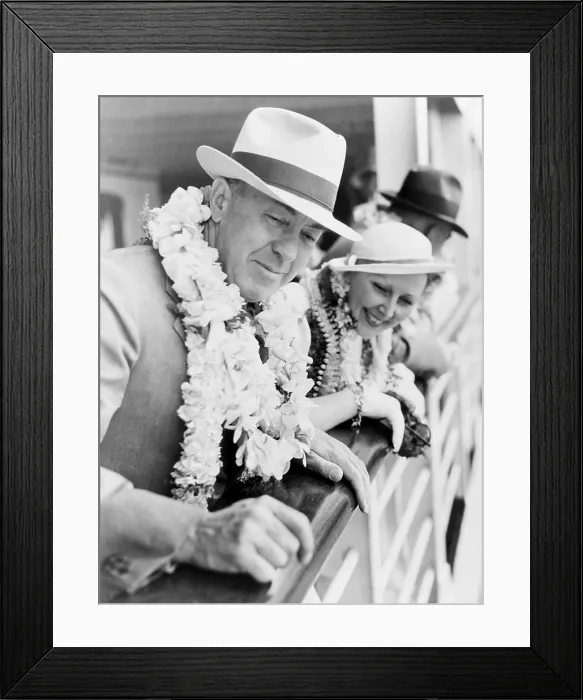Framed Print : Edgar Rice Burroughs (1875-1950), American author and creator of Tarzan stories, and his wife, leaning over ship's rail as they arrive in Hawaii