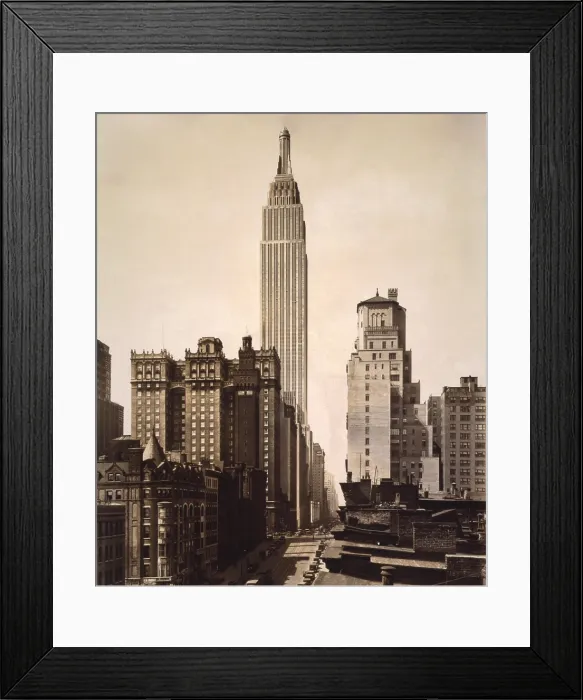 Framed Print : Empire State Building, in New York City shortly after completion in 1931. The Art Deco design of the tower was the final stage of external construction. Photo by Irving Underhill