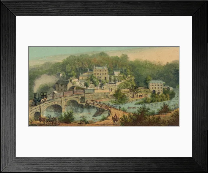 Framed Print : Early railroad crossing a bridge in front of the Chester Mill, established in 1831, in the town of Ellicott Mills, Maryland