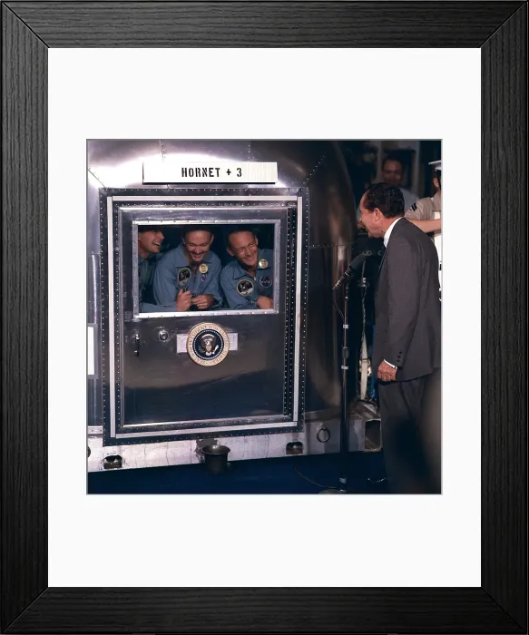 Framed Print : President Nixon personally welcomes the Apollo 11 astronauts then in Mobile Quarantine Facility aboard the USS Hornet the back to Earth. July 24 1969