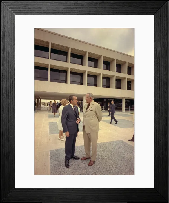 Framed Print : President Nixon standing with Lyndon Johnson outside the LBJ Library in Austin Texas. May 22 1971