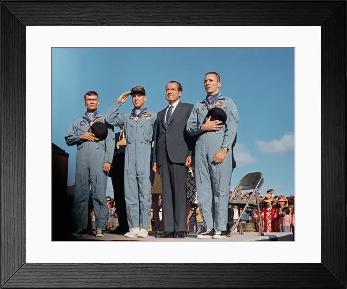 Framed Print : President Richard Nixon and the Apollo 13 crew salute U.S. flag. The astronauts John Swigert Jim Lovell and Fred W