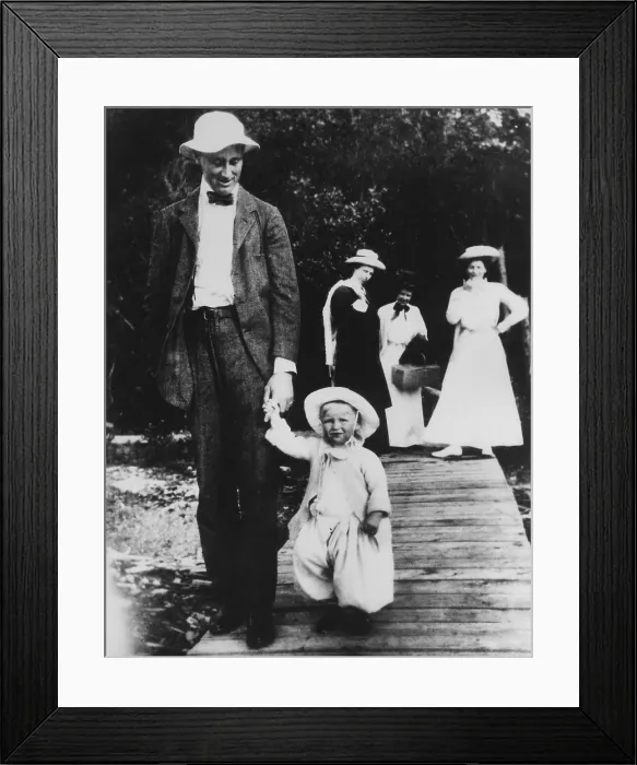 Framed Print : Franklin D. Roosevelt with his first child, Anna, at Campobello. 1908. Eleanor is with the group in the distance. (BSLOC_2013_6_24) Framed Print : Franklin D. Roosevelt with his first child, Anna, at Campobello. 1908. Eleanor is with the group in the distance. (BSLOC_2013_6_24)