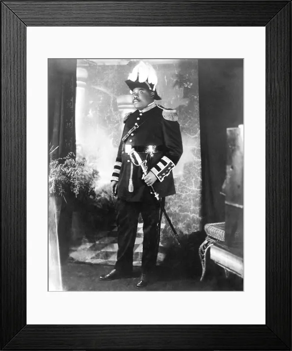 Framed Print : Marcus Garvey (1887-1940), in his flamboyant uniform decorated with plumage, brass buttons, braid, and sword